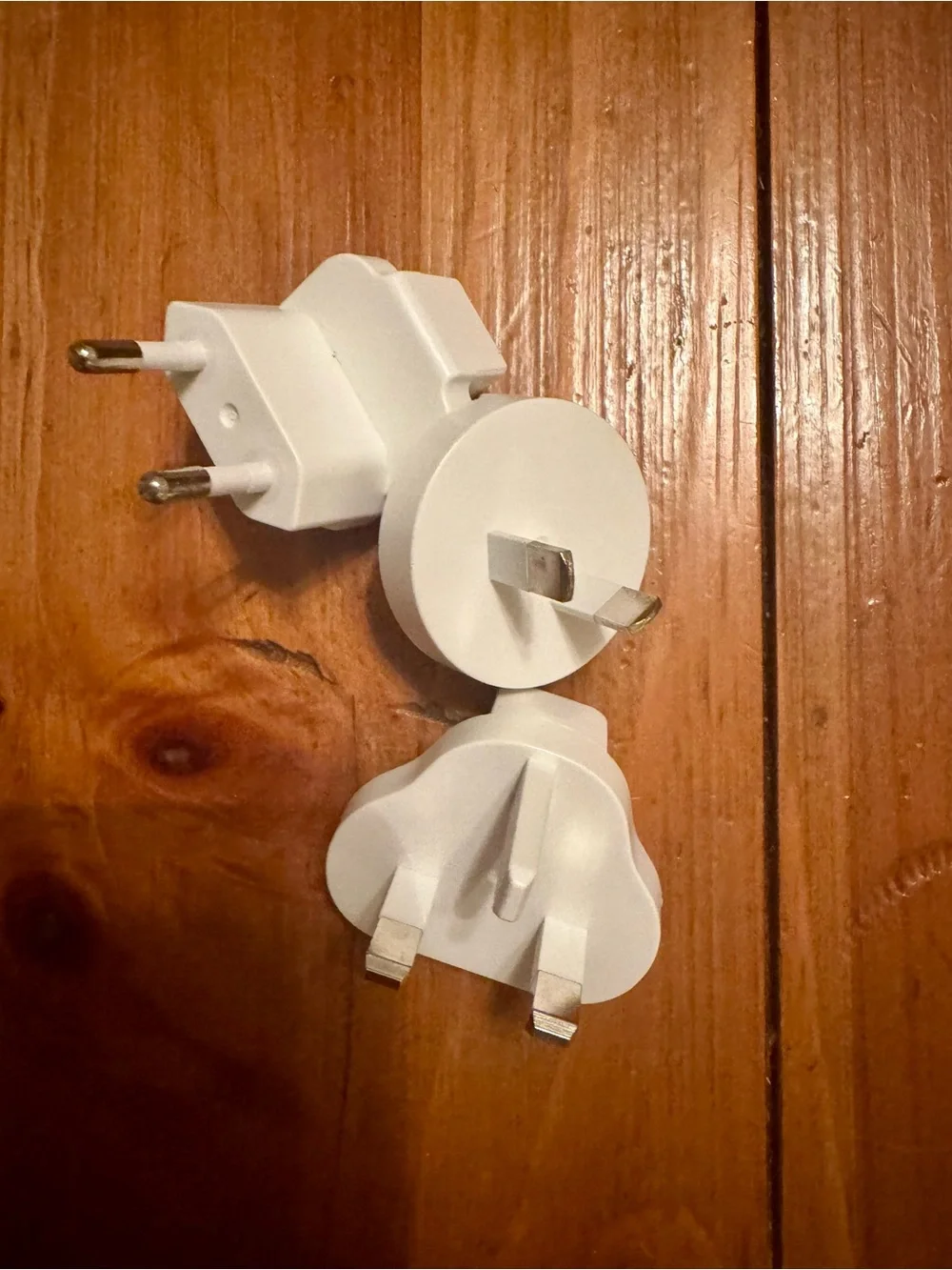 Portable White Travel Charger with Wireless Pad and Plug Adapters
